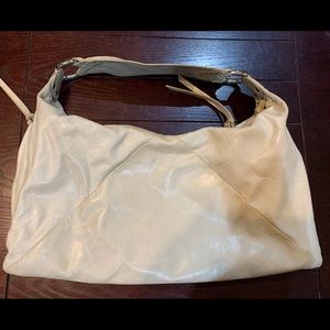 Ivory colored HOBO purse with side pocket